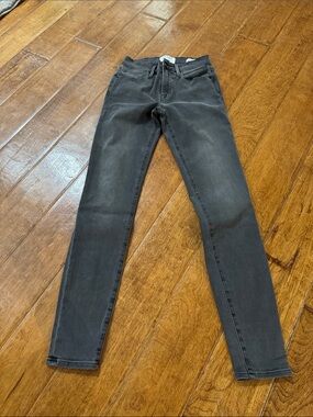 Frame Denim Skinny Jeans in Washed Black